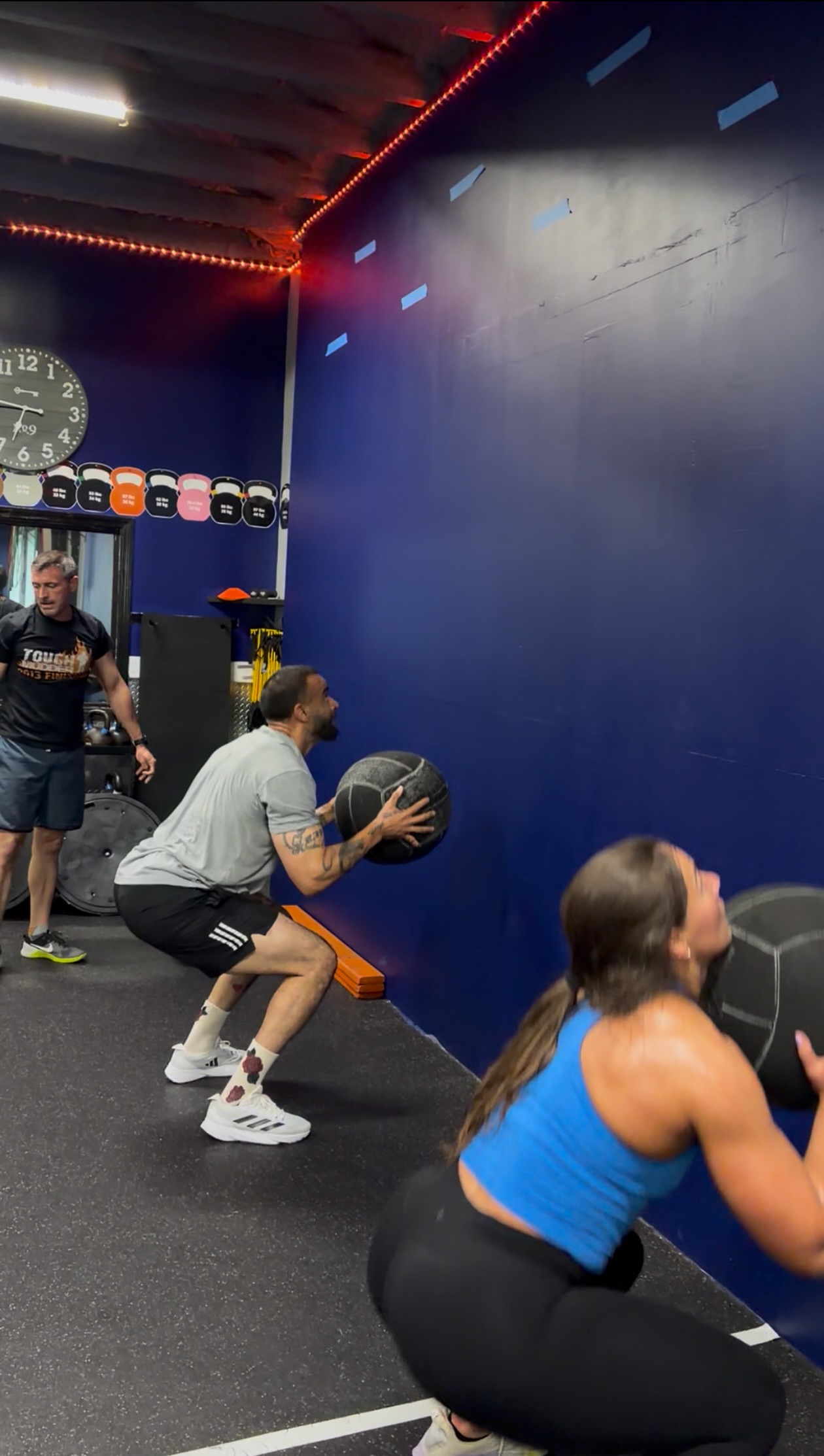 Medicine ball squat throw